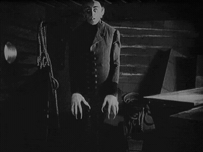 Black And White Person With Blue Circle GIF