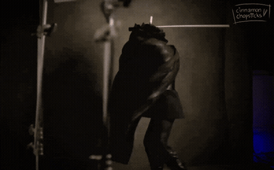 Black And White Person With Cinnamon And Chopsticks GIF