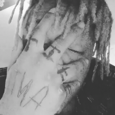 Black And White Person With Dreadlocks And Hand Tattoo GIF