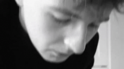 Black And White Person With Eyes Closed GIF