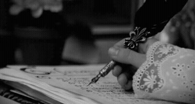 Black And White Person Writing With Pen GIF