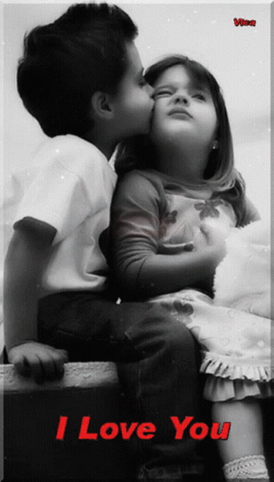 Black And White Photo Boy Kissing Girl Saying I Love You GIF