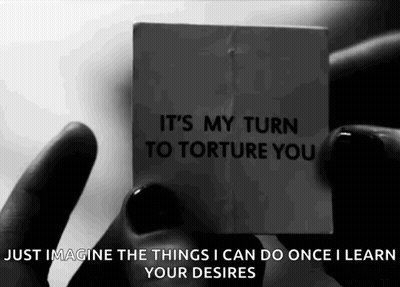 Black And White Photo Holding Paper Says It's My Turn To Torture You GIF