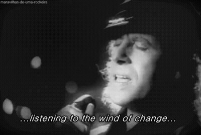 Black And White Photo Listening To The Wind Of Change GIF