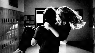 Black And White Photo Man Carrying Woman Hallway GIF