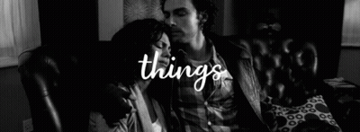 Black And White Photo Man Kissing Woman On Cheek GIF