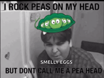 Black And White Photo Man With Peas On Head Saying I Rock Peas On My Head GIF