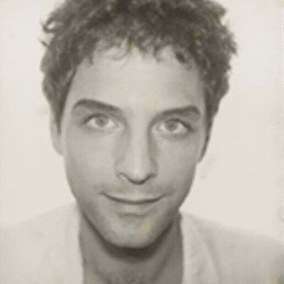 Black And White Photo Of A Man's Face GIF