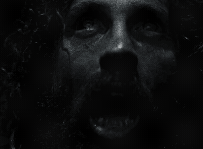Black And White Photo Of A Person's Face GIF
