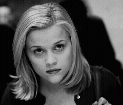 Black And White Photo Of Blonde Woman Looking At Camera GIF