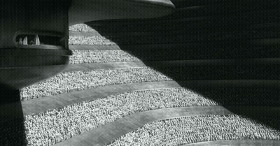 Black And White Photo Of Building With People GIF
