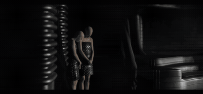 Black And White Photo Of Curtains Hanging In A Room GIF