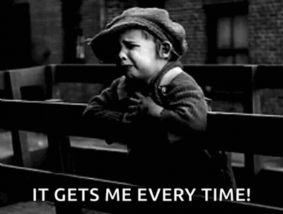 Black And White Photo Of Little Boy On Bench GIF