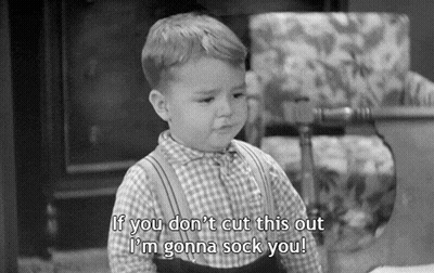 Black And White Photo Of Little Boy Saying If You Don't Cut This Out I'm Gonna Sock You GIF