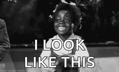 Black And White Photo Of Little Girl Smiling Saying I Look Like This GIF