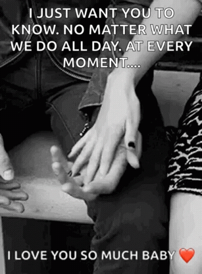Black And White Photo Of Man And Woman Holding Hands GIF