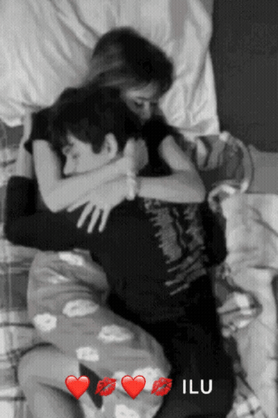 Black And White Photo Of Man And Woman Hugging Saying Ilu GIF