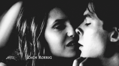 Black And White Photo Of Man And Woman Kissing GIF