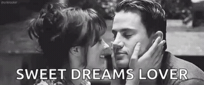Black And White Photo Of Man And Woman Kissing GIF