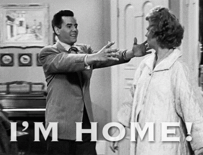 Black And White Photo Of Man And Woman Saying I'm Home GIF