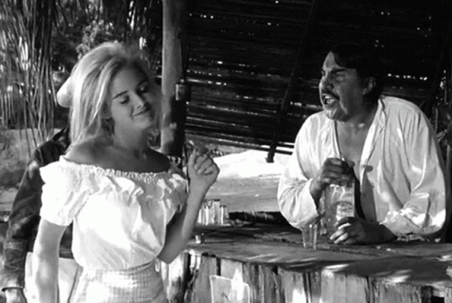 Black And White Photo Of Man And Woman Talking GIF
