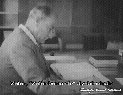 Black And White Photo Of Man At Desk Saying Zafer GIF