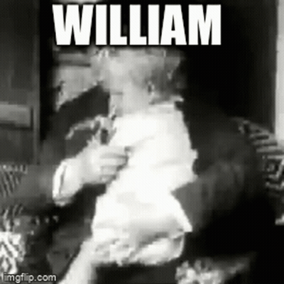 Black And White Photo Of Man Holding Baby William GIF
