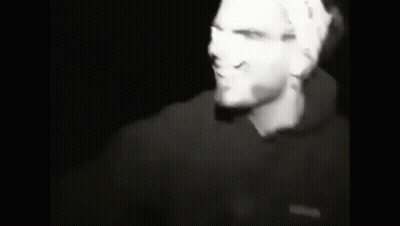 Black And White Photo Of Man In Beanie And Glasses GIF