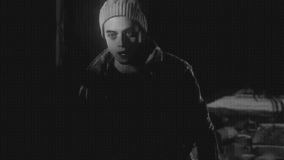 Black And White Photo Of Man In Beanie And Jacket GIF