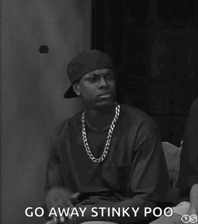 Black And White Photo Of Man In Hat And Necklace GIF