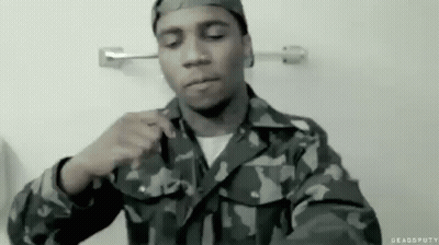 Black And White Photo Of Man In Military Uniform GIF