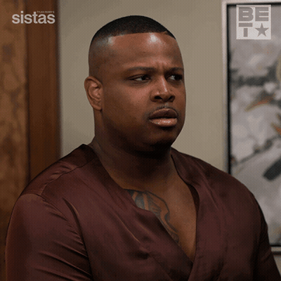 Black And White Photo Of Man In NFL Jersey GIF
