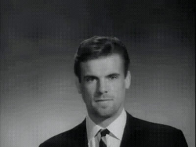 Black And White Photo Of Man In Suit And Tie GIF