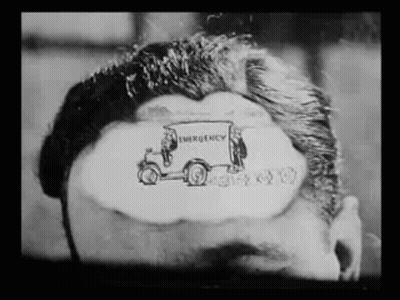 Black And White Photo Of Man's Head With Emergency Vehicle Drawing GIF