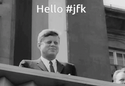 Black And White Photo Of Man Saying Hello #JFK GIF