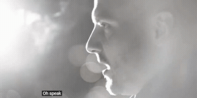 Black And White Photo Of Man Saying Oh Speak Low GIF