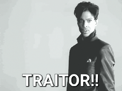 Black And White Photo Of Man Saying Traitor GIF