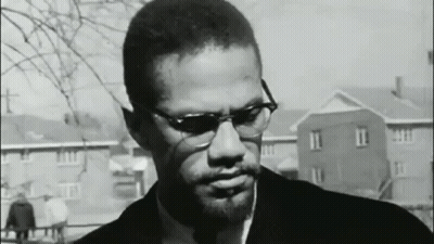 Black And White Photo Of Man With Glasses And Beard GIF