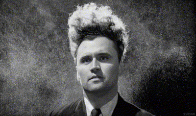 Black And White Photo Of Man With White Hair GIF