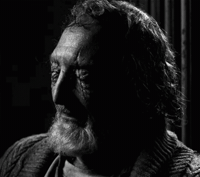 Black and White Photo of Old Man With Beard and Long Hair