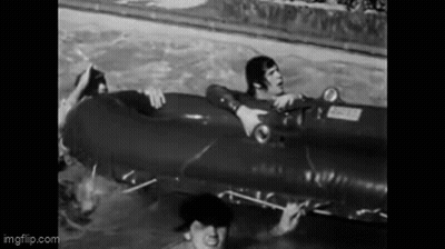 Black And White Photo Of People Carrying Coffin Saying Fuck GIF