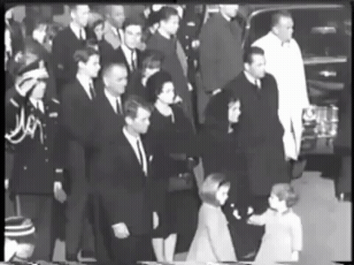 Black And White Photo Of People In Suits GIF