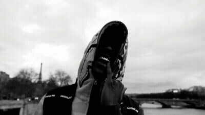 Black And White Photo Of Person In Hooded Jacket Saying Hood GIF