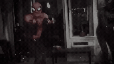 Black And White Photo Of Person In Spider-Man Costume GIF