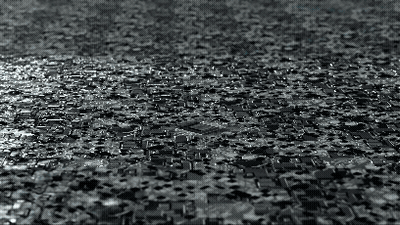 Black And White Photo Of Puzzle Pieces On Floor GIF