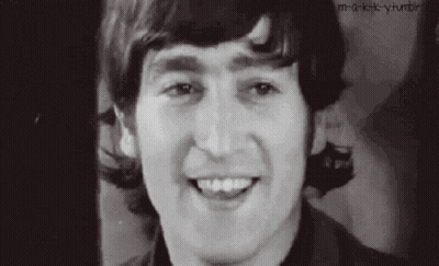 Black And White Photo Of Smiling Man GIF