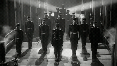 Black and White Photo of Soldiers Standing in Line