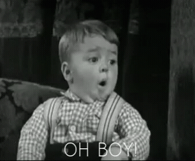Black And White Photo Of Surprised Little Boy GIF