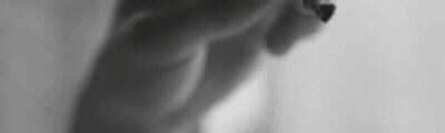 Black And White Photo Of Torso And Legs GIF