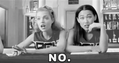 Black And White Photo Of Two Cheerleaders Saying No GIF